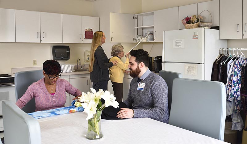 Faculty working together in the employee lounge
